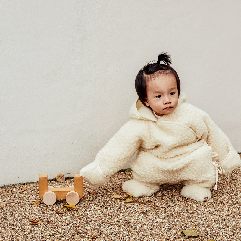 BINIBAMBA Combinaison en laine mérinos à capuche Milk