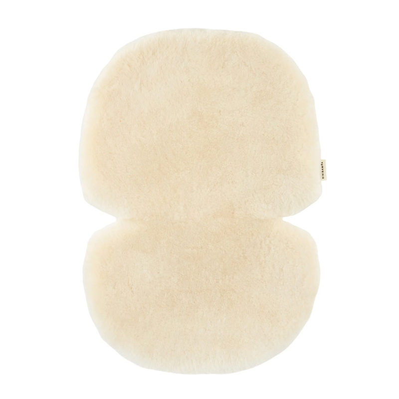 Beige Schaffell-Sitzauflage für den Buggy