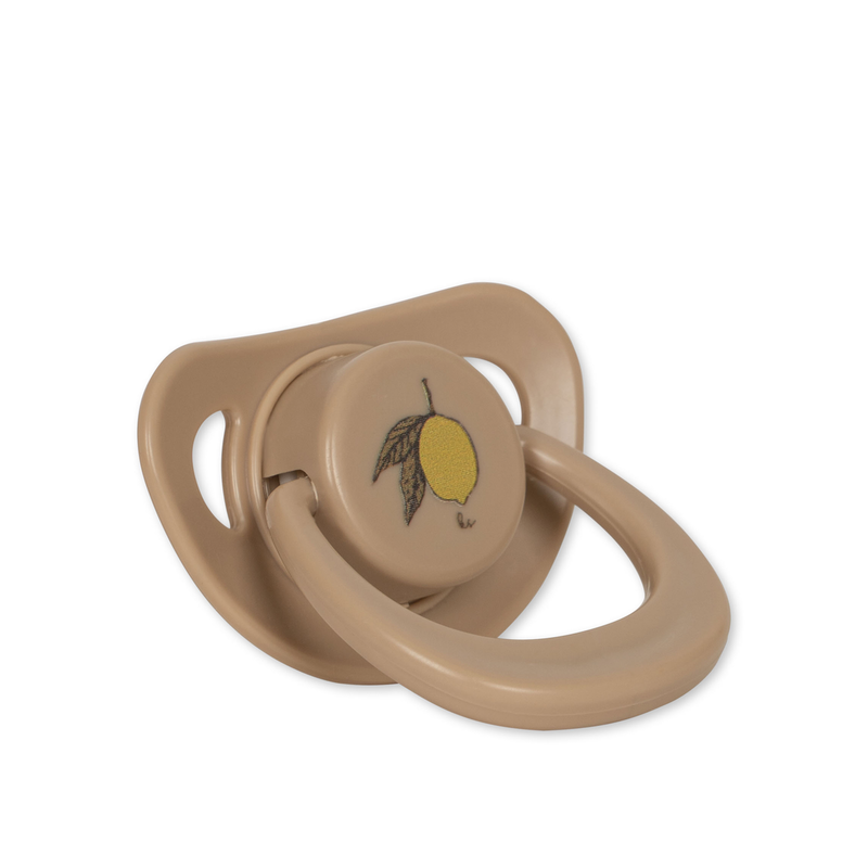 Puppenschnuller in Beige mit einer Zitrone vorne