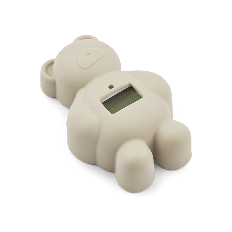 Liewood Badethermometer in Bärenform in beige. 