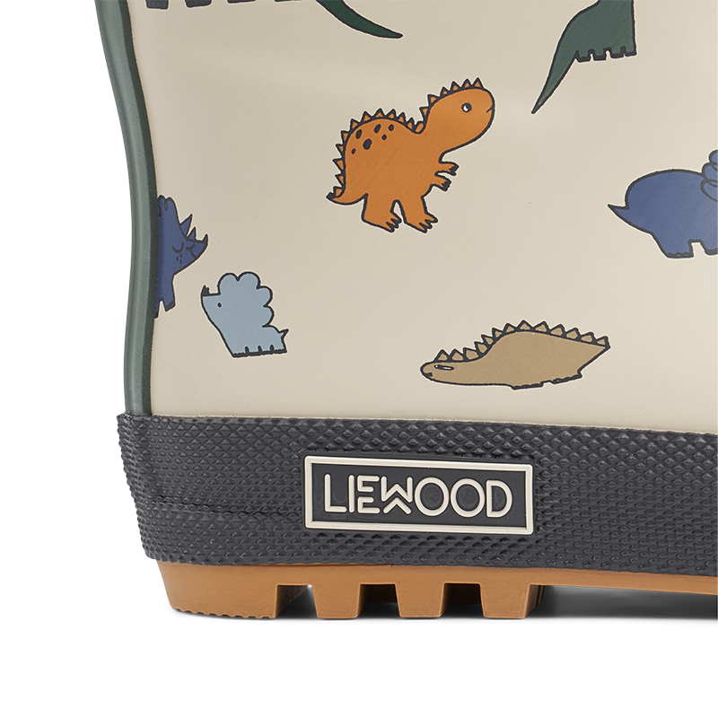Nahaufnahme von Regenstiefel für Kinder mit Dinoprint von Liewood.