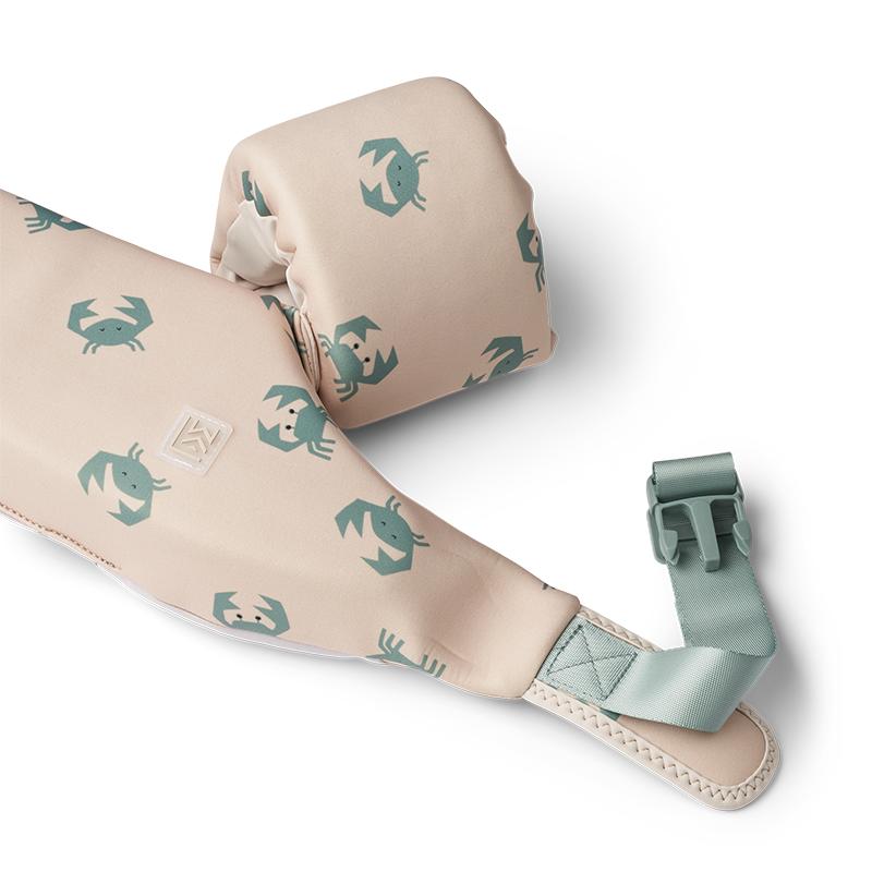 Schwimmgürtel mit Schwimmflügel in Beige mit grünem Krabbenmuster.