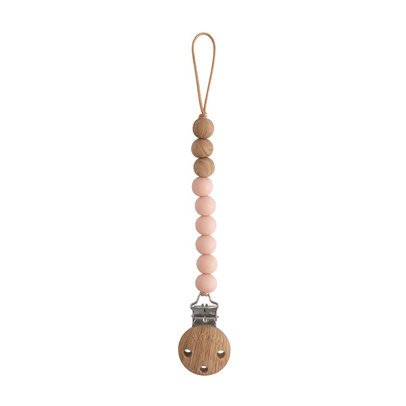 Mushie Schnullerkette Eva in der Farbe Blush. 