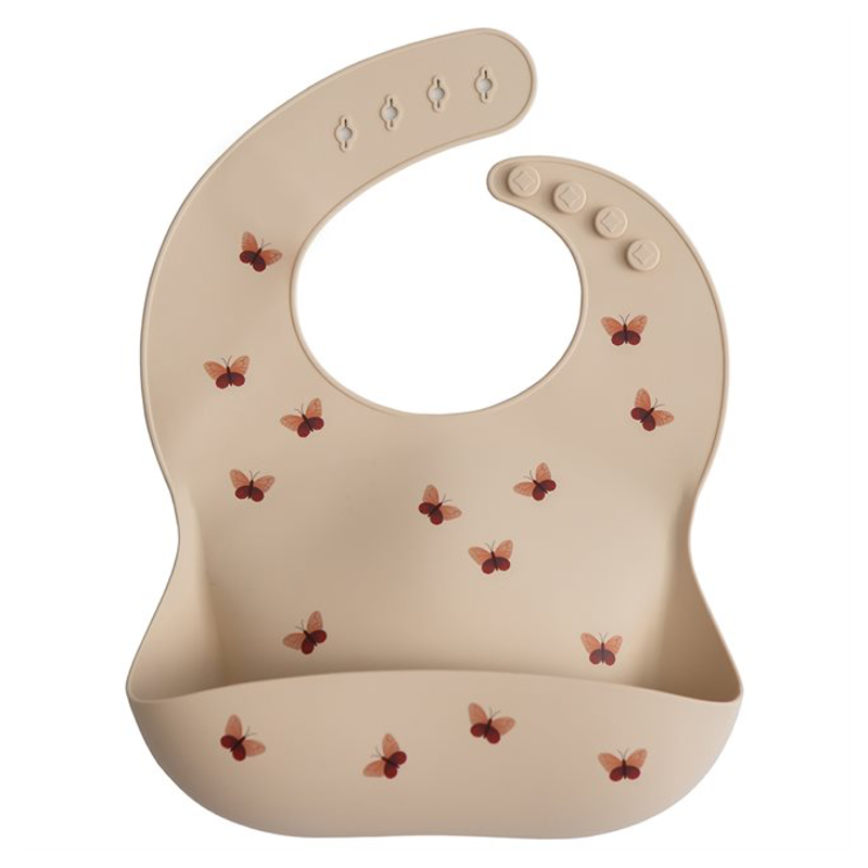 Silikon Lätzchen mit Auffangtasche in Beige mit Schmetterlingen von Mushie
