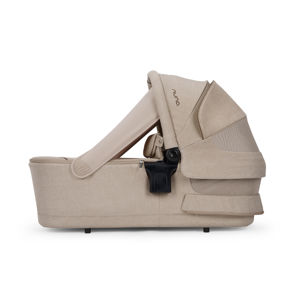 NUNA Triv lx Babywanne Cosmopolitan mit eingebautem Sonnenverdeck mit Magnethalterung
