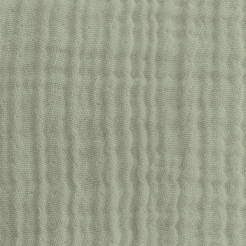 Nahaufnahme von Still- und Schwangerschaftskissen in Beige aus Musselin von Theraline.