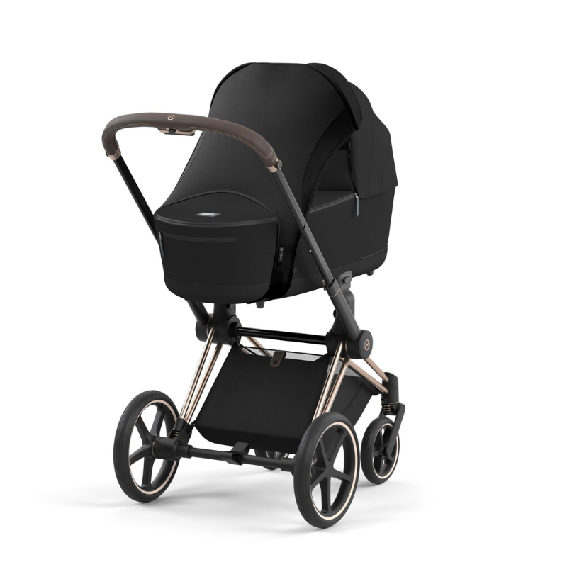 Kinderwagen in Schwarz von Cybex mit schwarzem Sonnensegel.