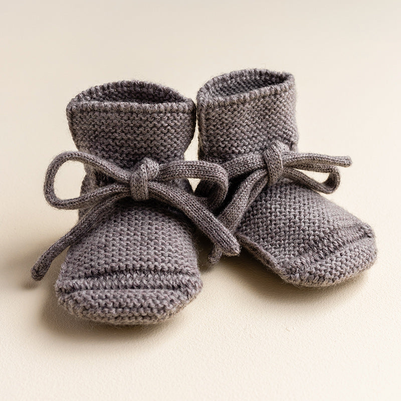 Chaussons bébé en maille loutre blancs